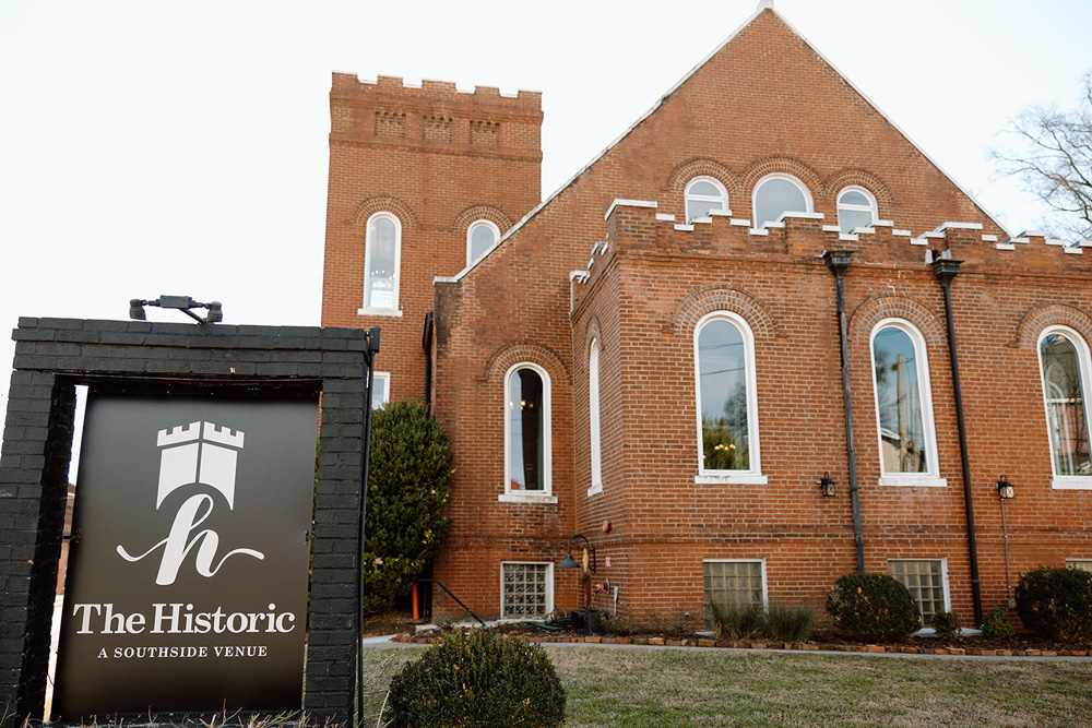 Showcasing a historic, red brick church as one of the Wedding Venues Chattanooga TN 