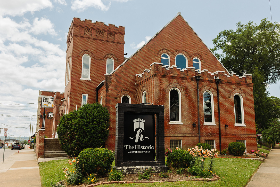 Showcasing a historic, red brick church as one of the Wedding Venues Chattanooga TN 